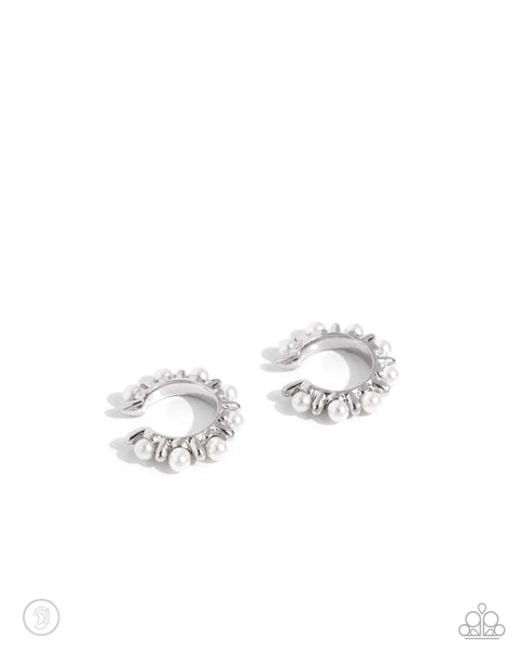 Bubbly Basic - White
Item #P5PO-CFWT-415XX
Glossy white pearls alternate with high-sheen silver spikes that curl around the ear in a refined pattern, creating an adjustable, one-size-fits-all cuff.

Sold as one pair of cuff earrings.