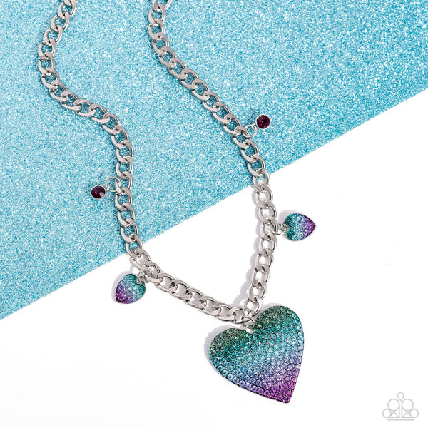 For the Most HEART
Item #P2ST-PRXX-169XX
Featuring an ombré effect, dainty silver hearts encrusted with a blinding display of green to turquoise to purple rhinestones and solitaire purple gems connect along a classic silver curb chain. An oversized silver