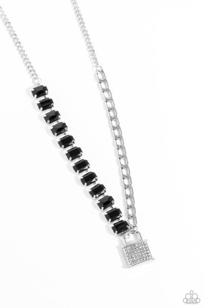 LOCK and Roll - Black
Item #P2ST-BKXX-223XX
Infused on a classic silver chain, a strand of thick silver curb chain, and a collection of exaggerated, black radiant-cut gems in silver pronged fittings combine to create a collision of industrial color around